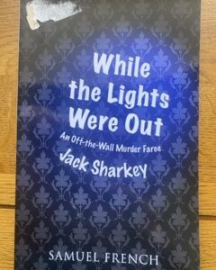 WHILE THE LIGHTS WERE OUT by Jack Sharkey